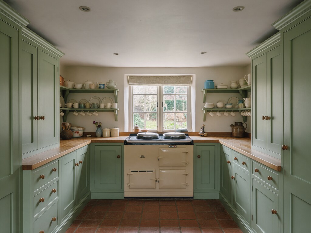 Sage green Shaker cottage kitchen with range cooker near Epping